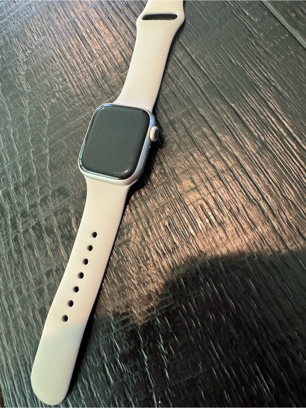 Apple Watch with Pink Display and Light Gray Band